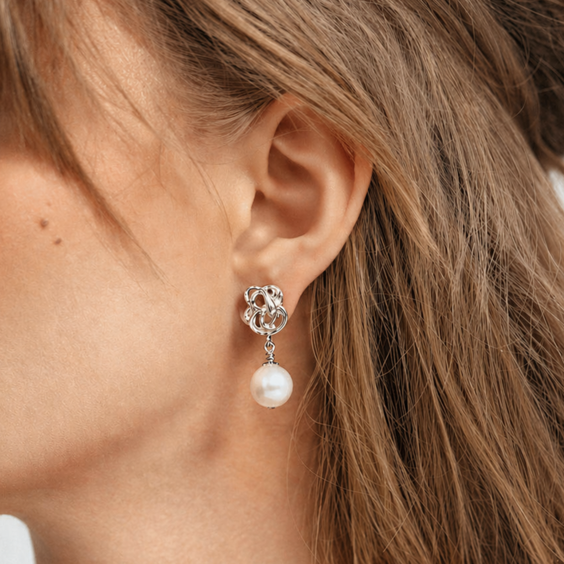 modeled view of abstract sterling silver pearl drop earrings by jessica liu