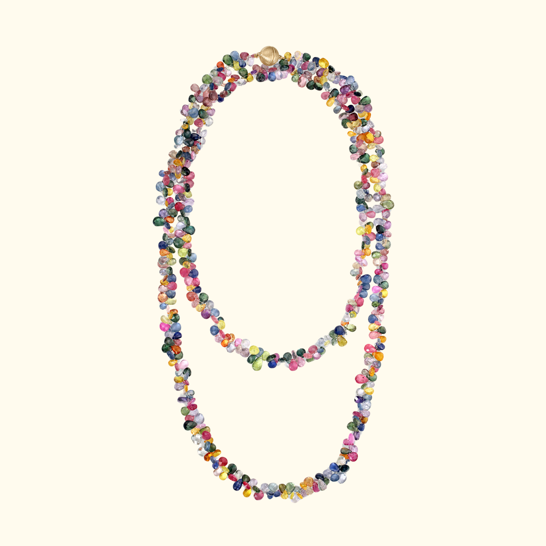 extra long multicolored sapphire gemstone necklace with a 14k gold ball clasp layered by jessica liu
