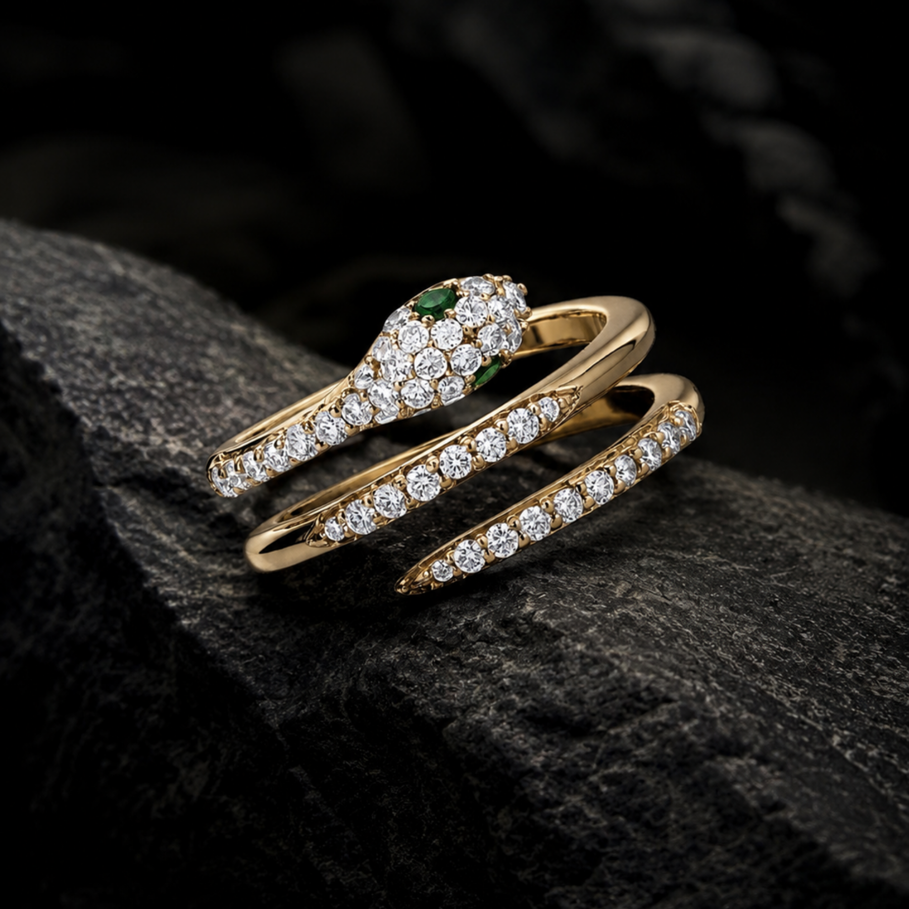 snake midi upper knuckle ring with pave white diamonds and green tsavorite eyes by jessica liu