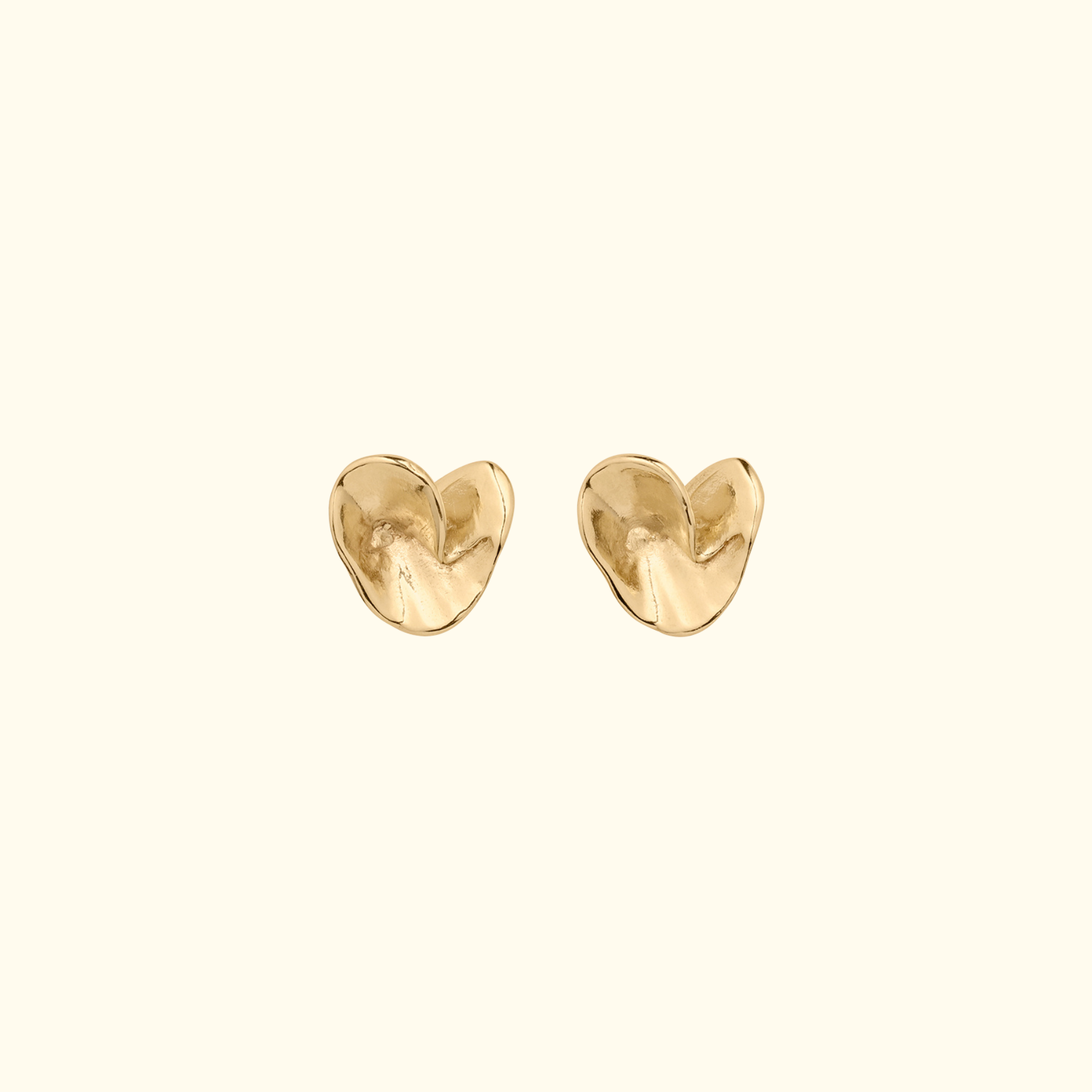 folded origami heart stud earrings in 14k gold by jessica liu