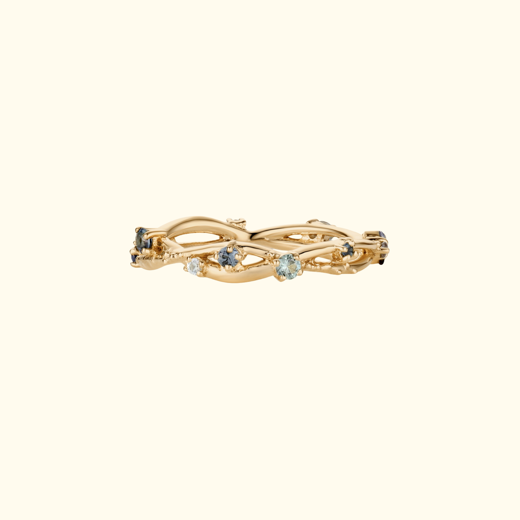 organic interweaving ring band with blue gemstones by jessica liu