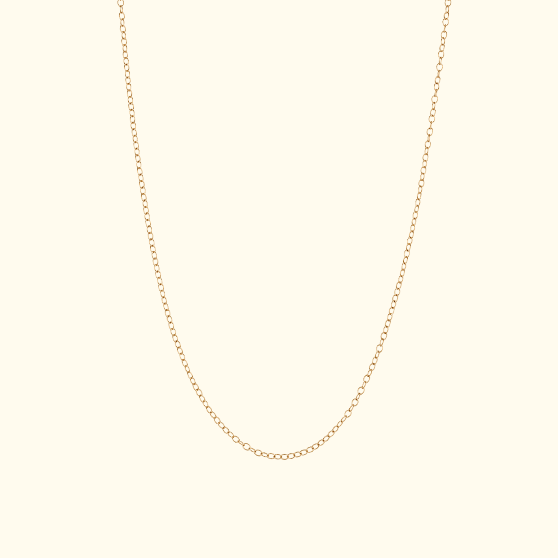 closeup shot of a 17" delicate gold cable chain by jessica liu