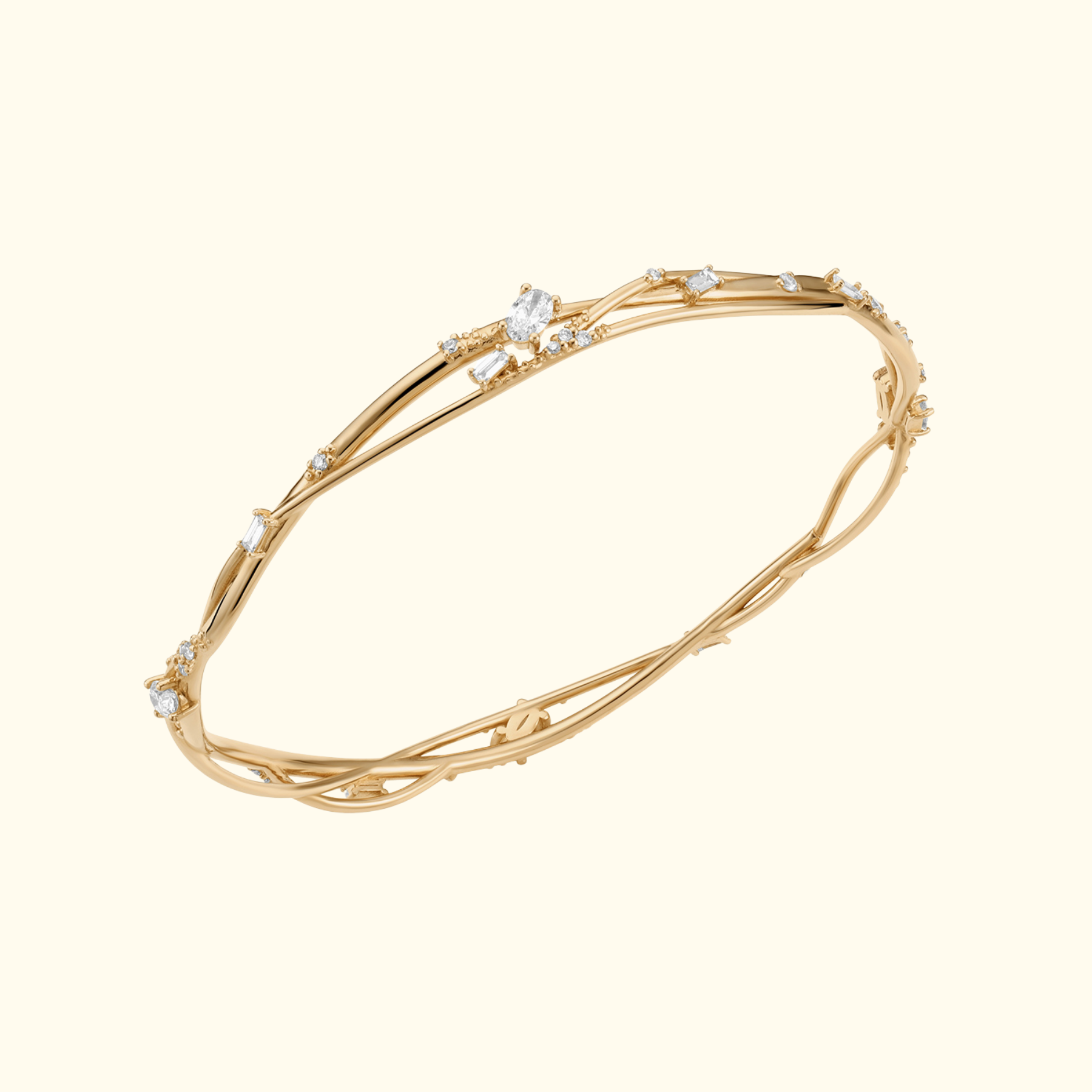 organic interweaving bangle in 14k gold studded with white diamonds by jessica liu