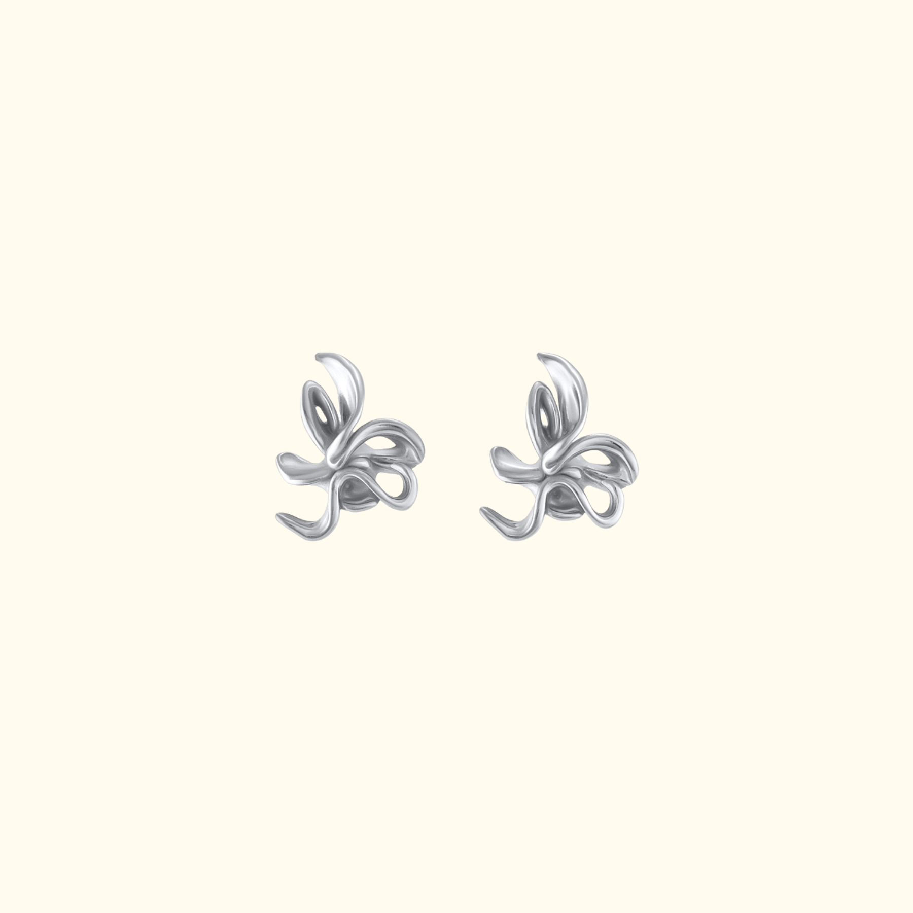 organic lily flower stud earrings in silver by jessica liu